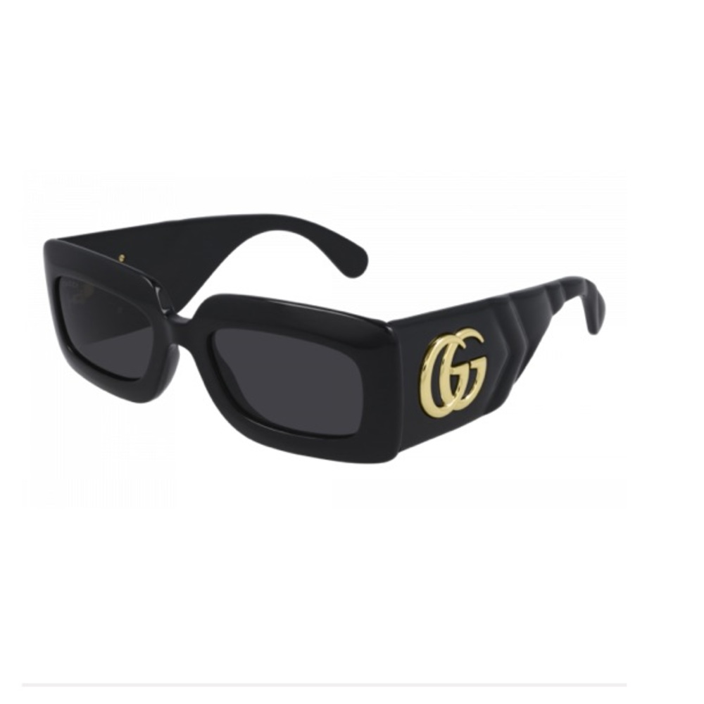 Black and gold Gucci sunglasses
